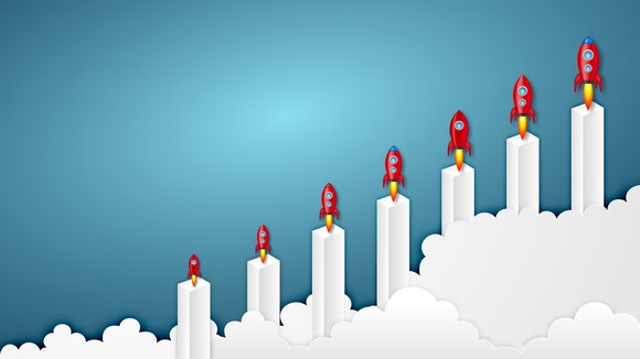 drawing of bar chart with rockets on each bar. 