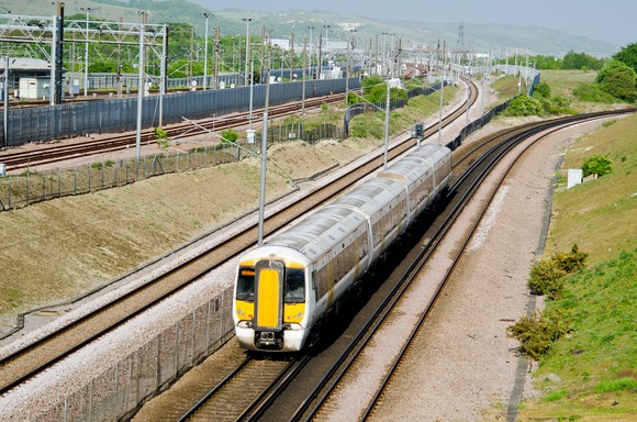 U.K. train passing the Channel Tunnel terminal at Folkestone.