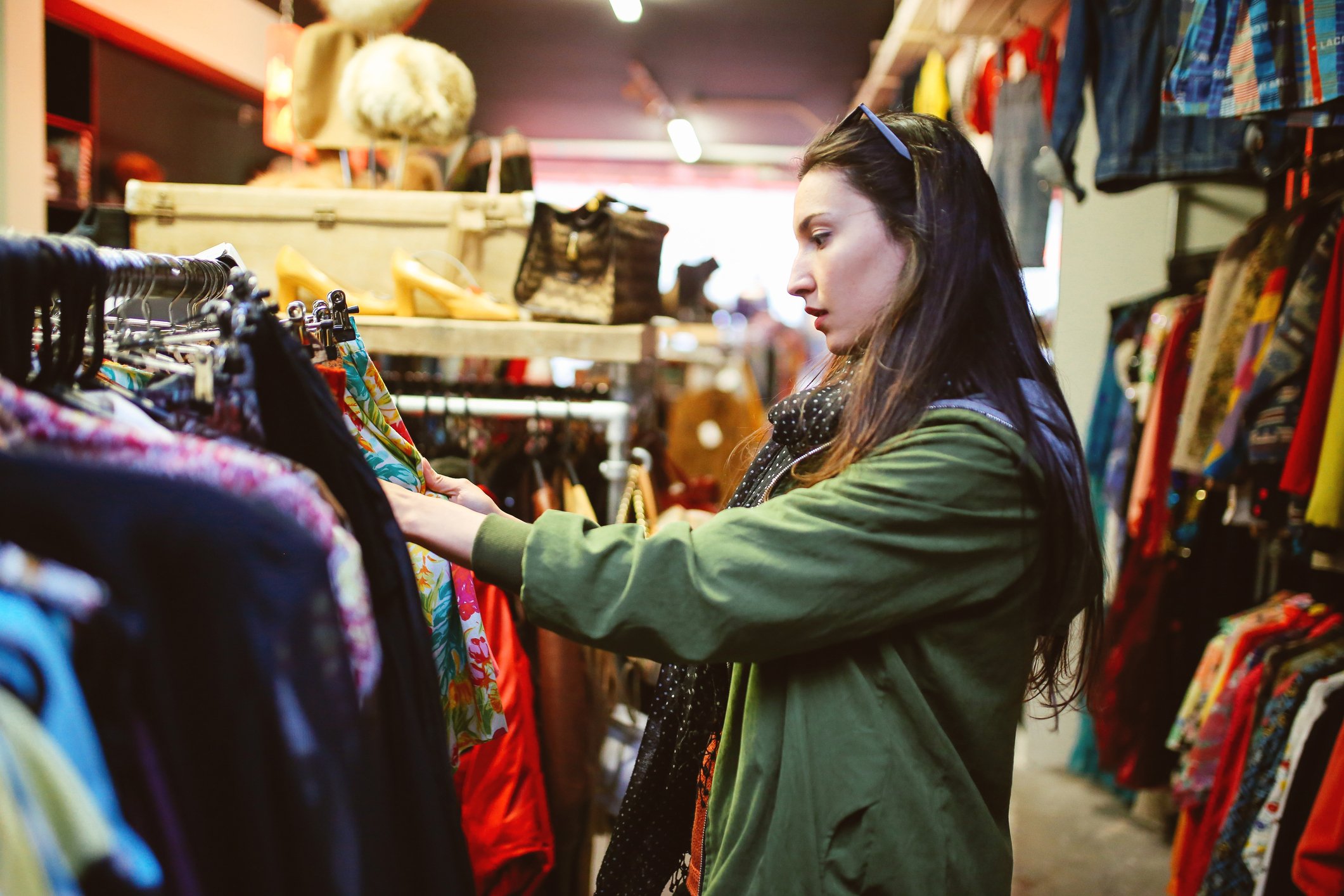 A woman shopping in a thrift store