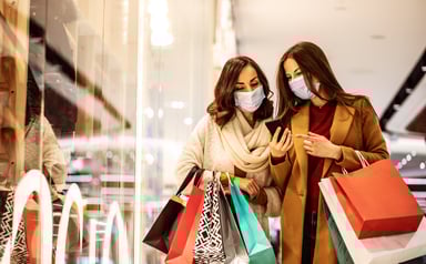 two women shopping in a store