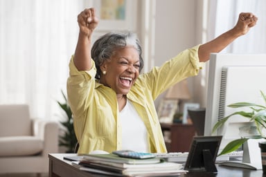 11-senior-celebrating-at-desk