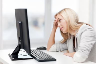 frustrated woman at computer