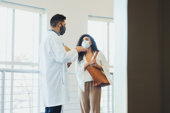 A doctor talks to a patient.