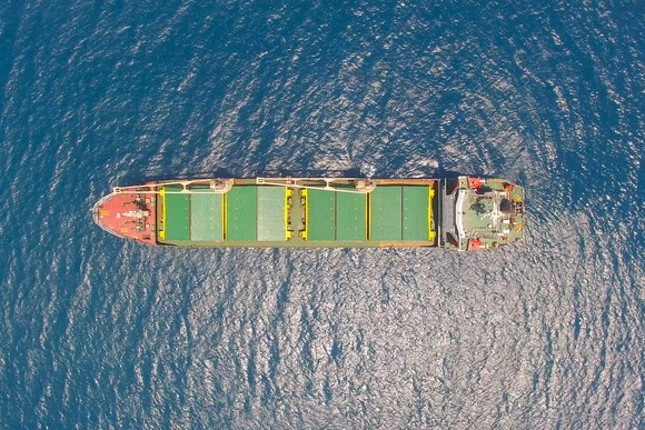 A cargo ship at sea.
