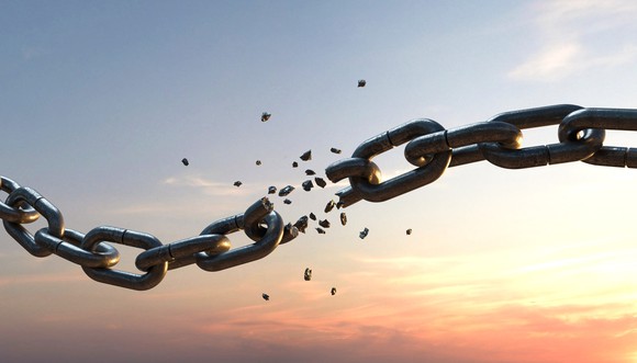 A chain breaking apart. 