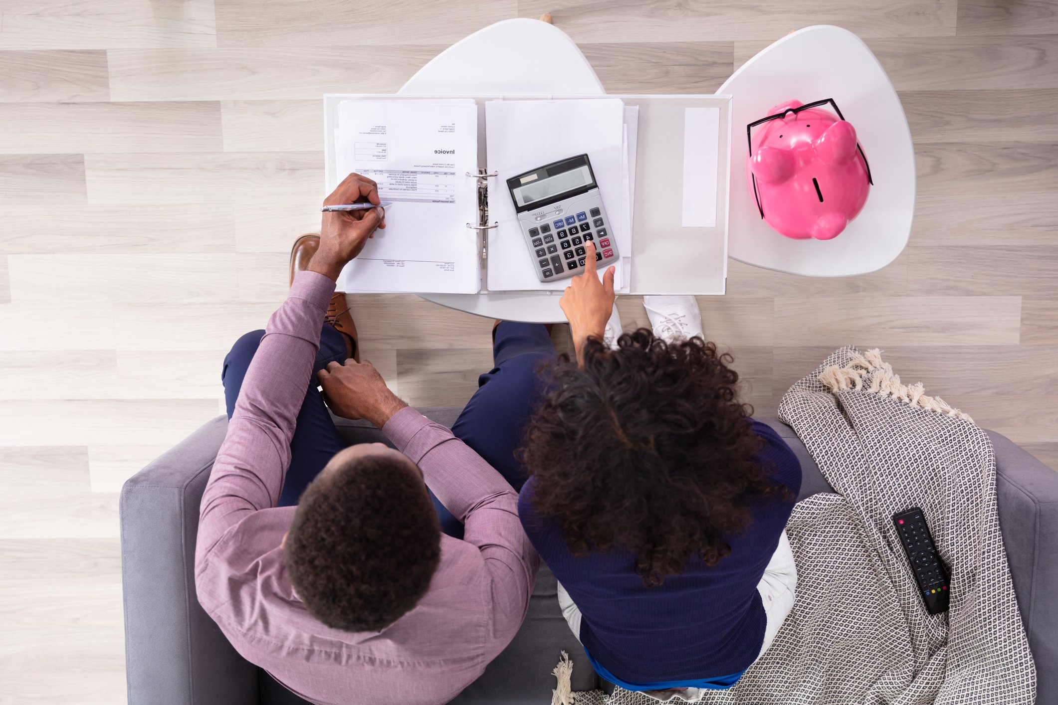 Two people reviewing savings and investments.