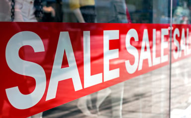 sale sign in window