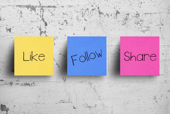 Three sticky notes labeled "like," "follow," and "share."
