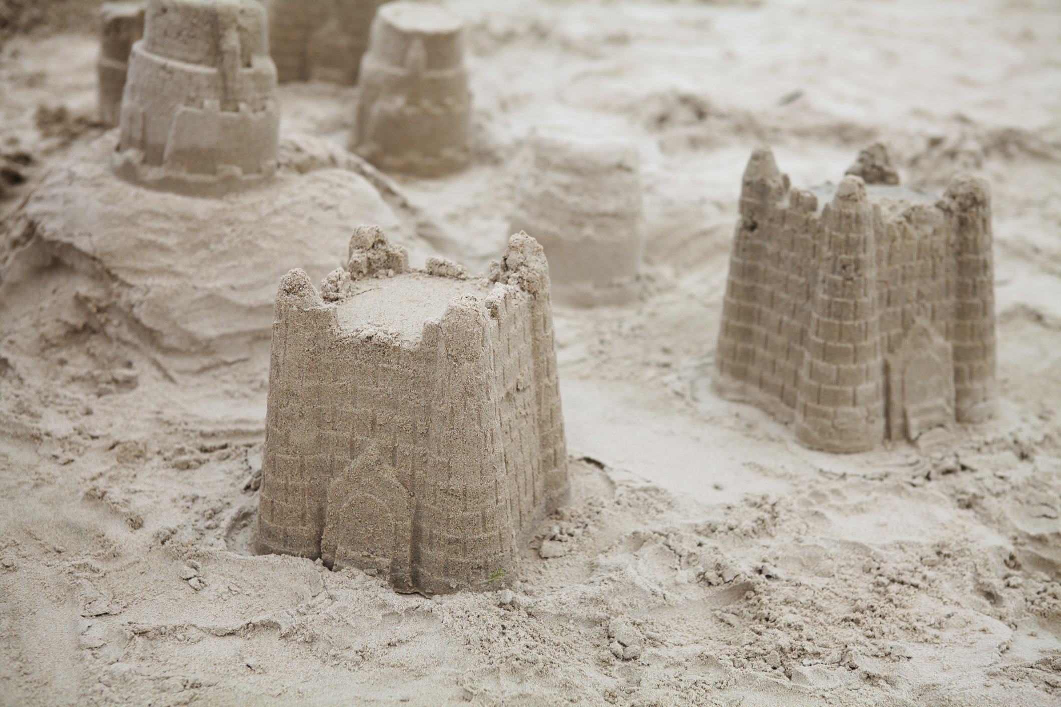 Sandcastles in a sandbox.