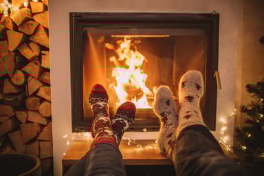 Fireplace Keeping Their Feet Warm on Christmas