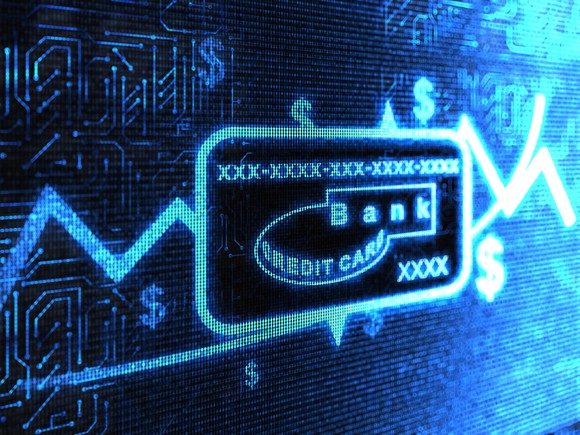 Graphic of a digital credit card in blue light.  