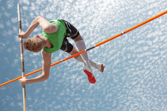 A pole vaulter in action. 