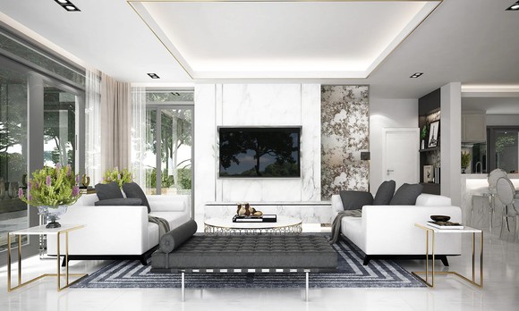Upscale living room furniture in a room with landscape windows.