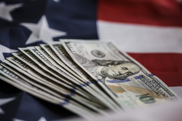 $100 bills on U.S. flag