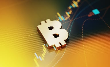 bitcoin symbol with a chart in the background