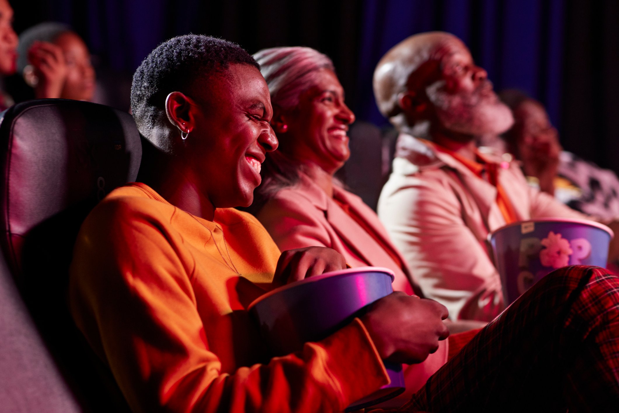 A group of people in a movie theater.