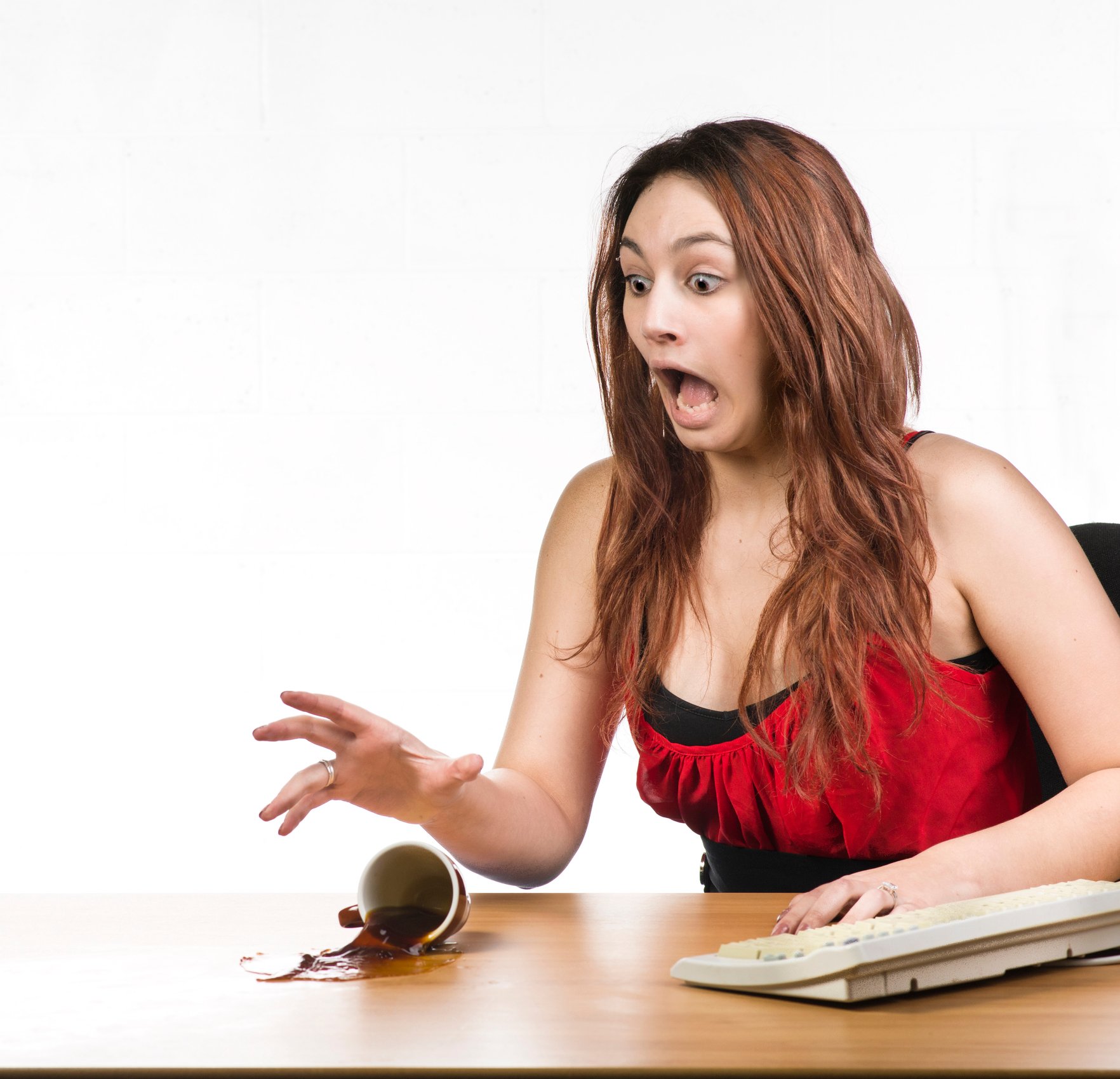 Woman spills her coffee.