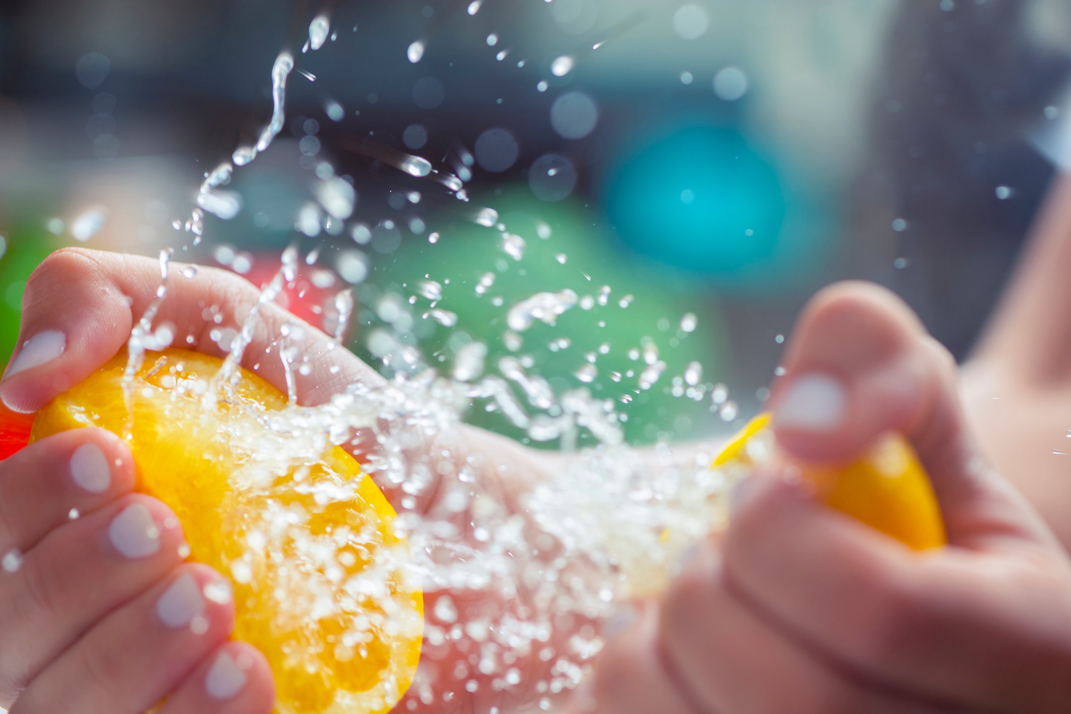 Person squeezing juice out of lemons.