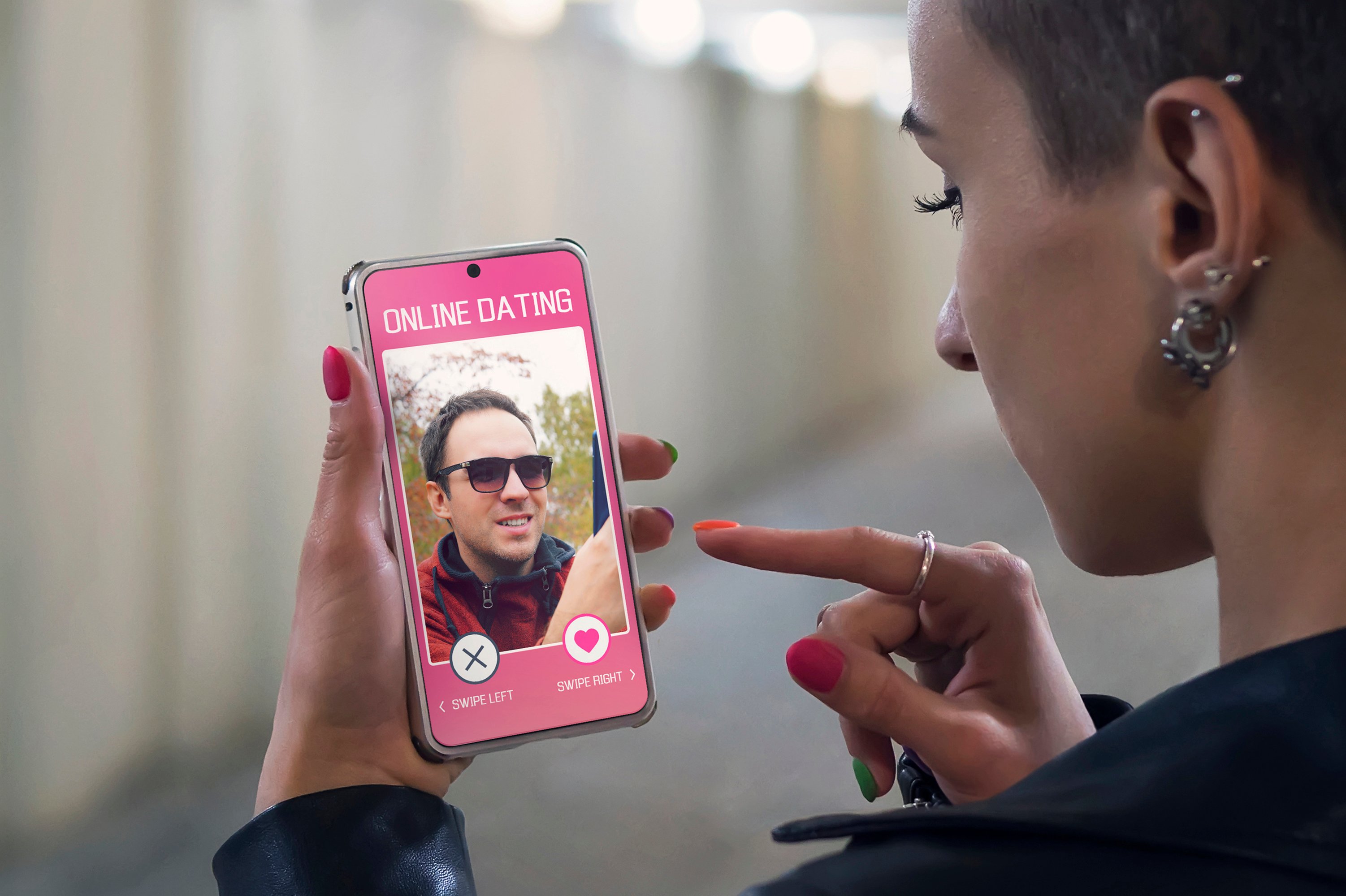 A person using a dating app on a smartphone.