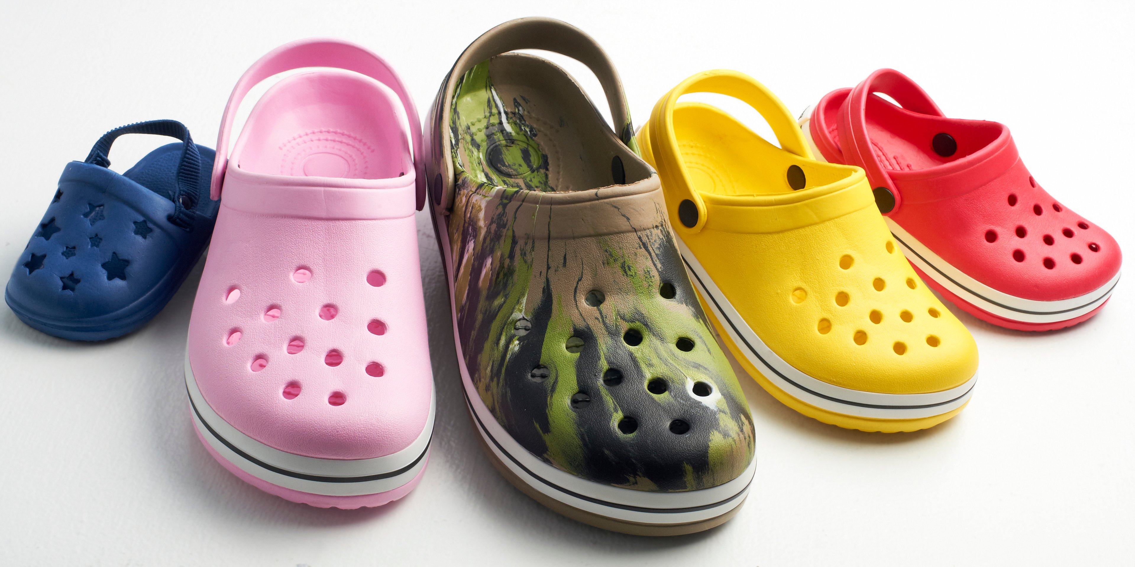 Five various colored casual clogs. 