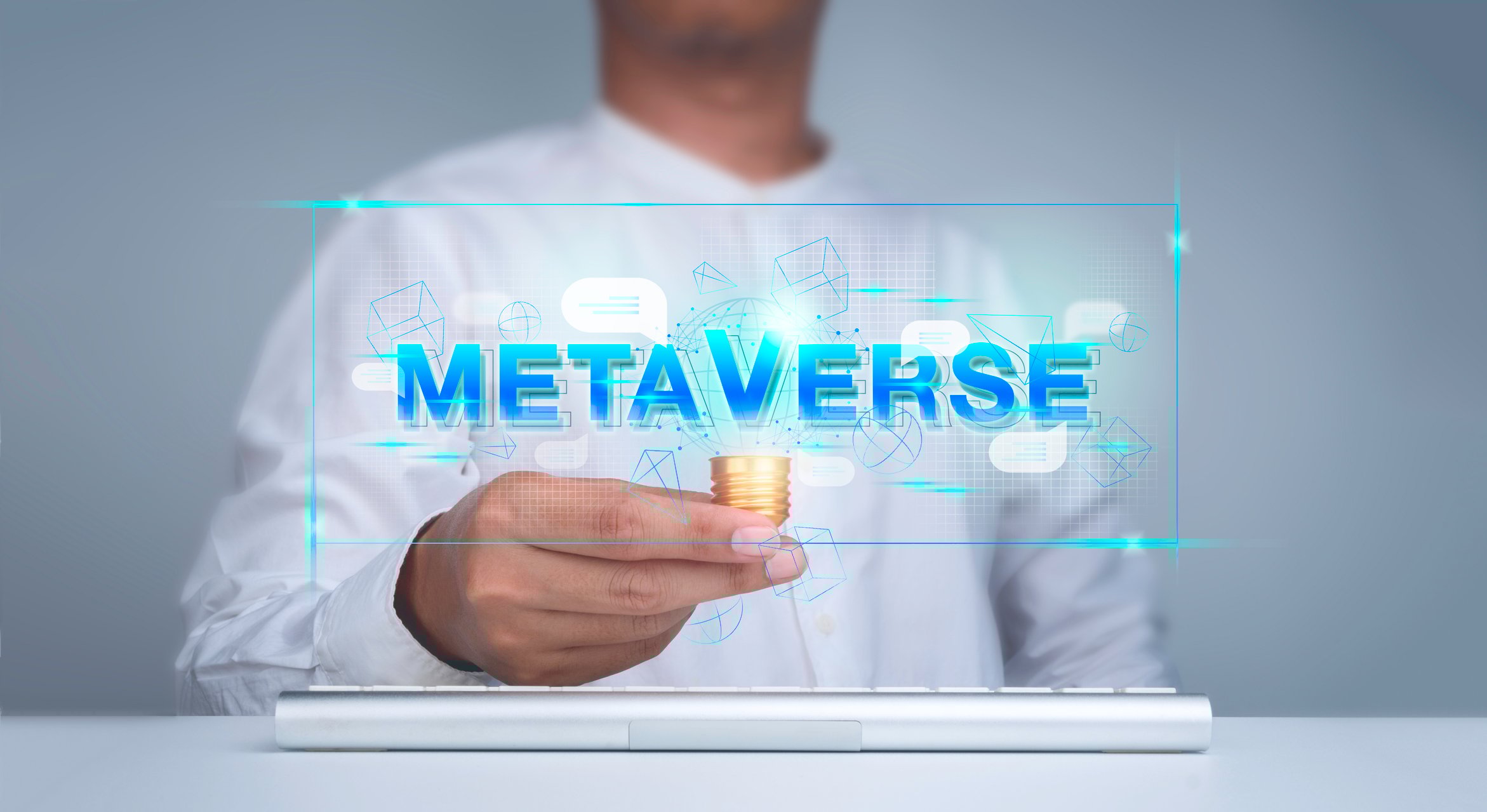 A person holding a stack of gold coins near a glass panel with "Metaverse" printed on it.