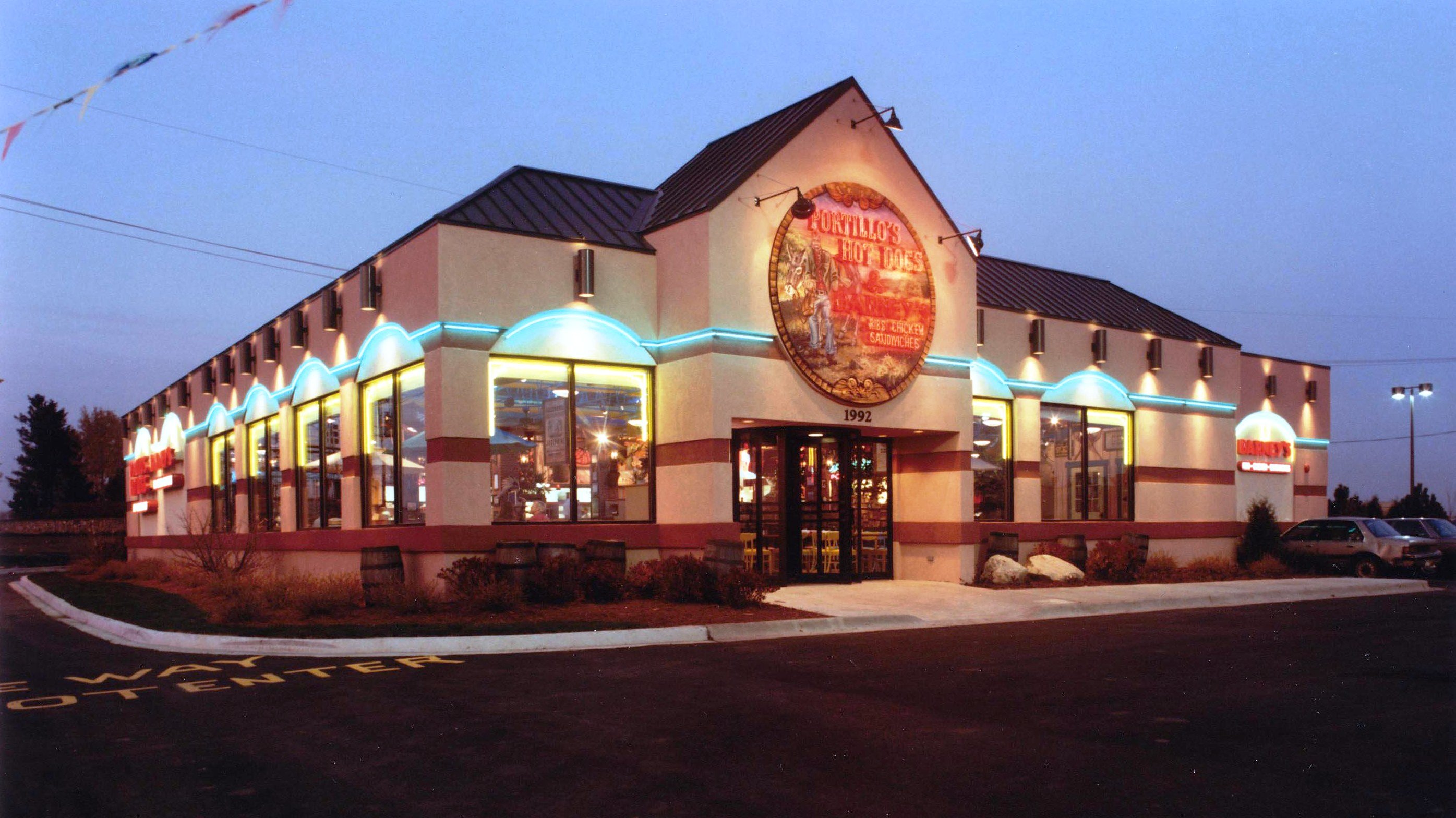 A Portillo's restaurant in the evening in Naperville.