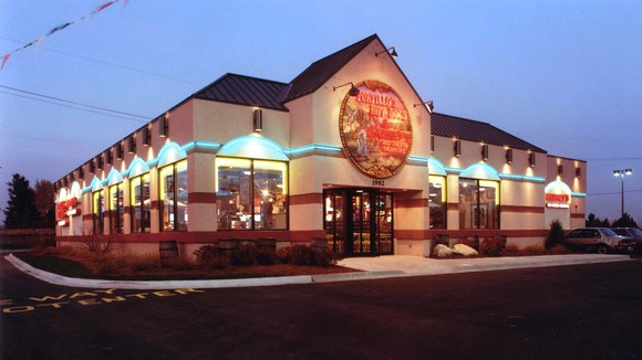 A Portillo's restaurant in the evening in Naperville.
