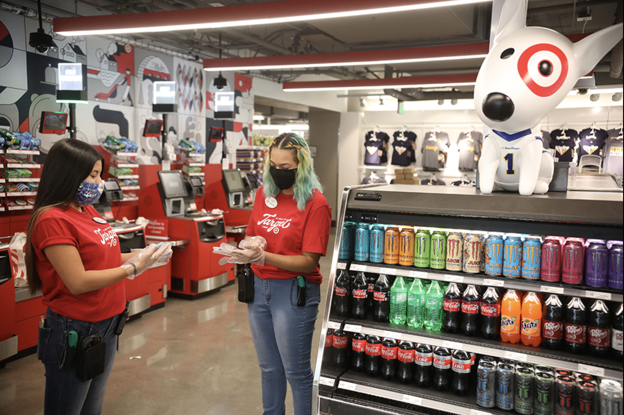 Two Target employees working in a store.