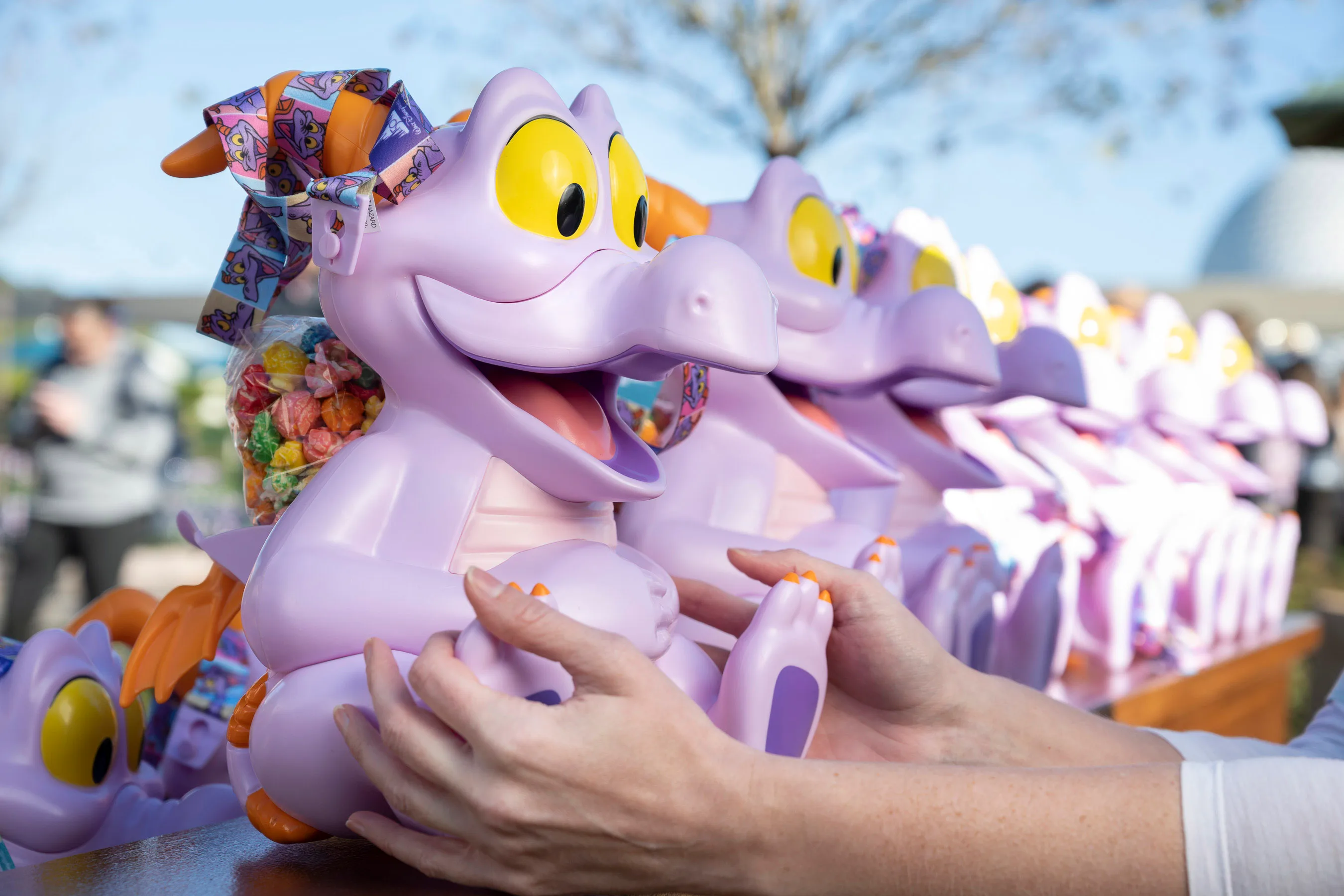 Disney's Figment character for sale with popcorn.