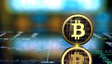 A representation of Bitcoin on top of a chart.