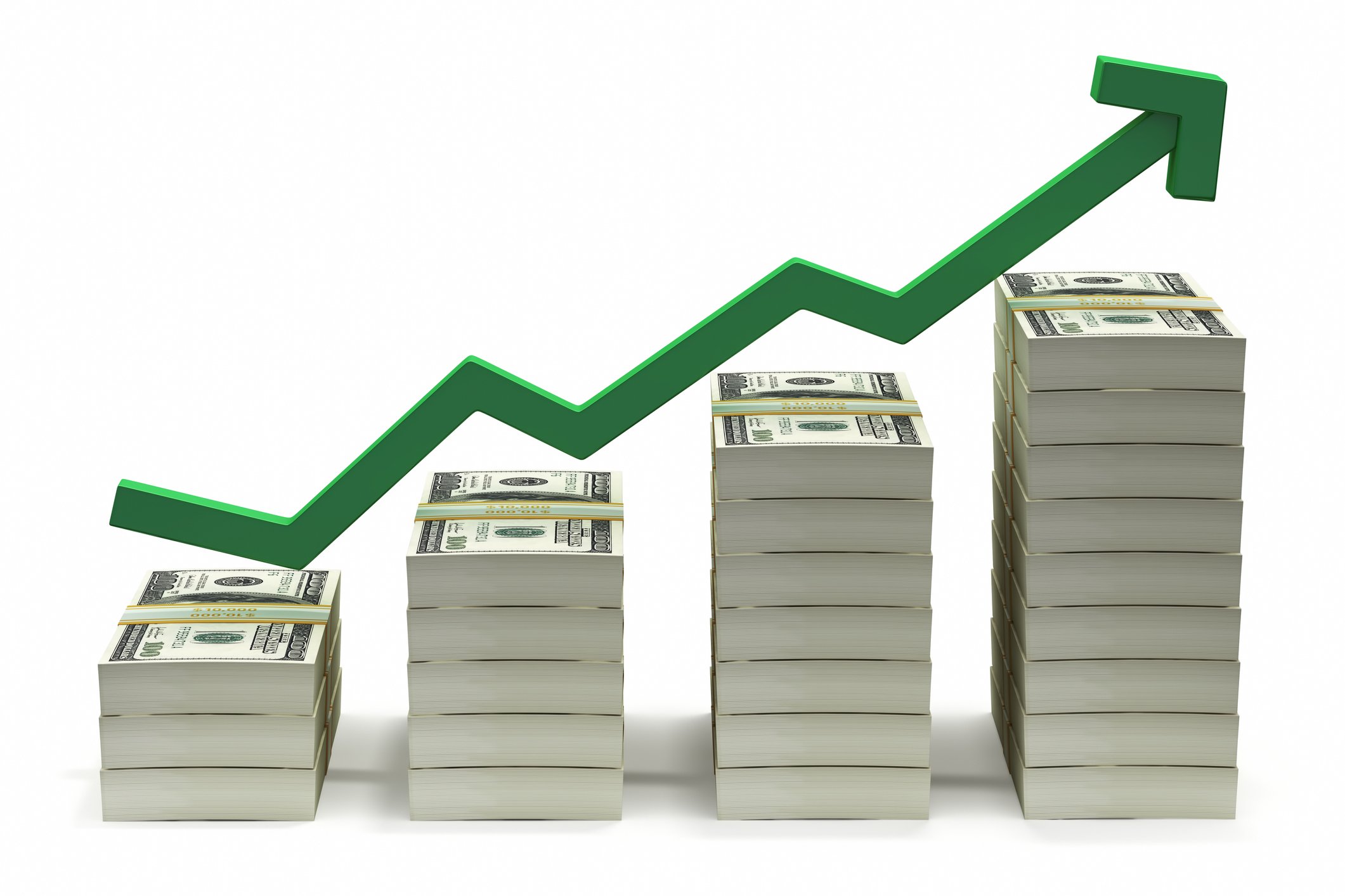 Growing stacks of U.S. currency notes.