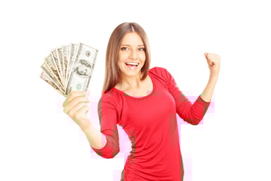 A woman happily holds $100 U.S. banknotes