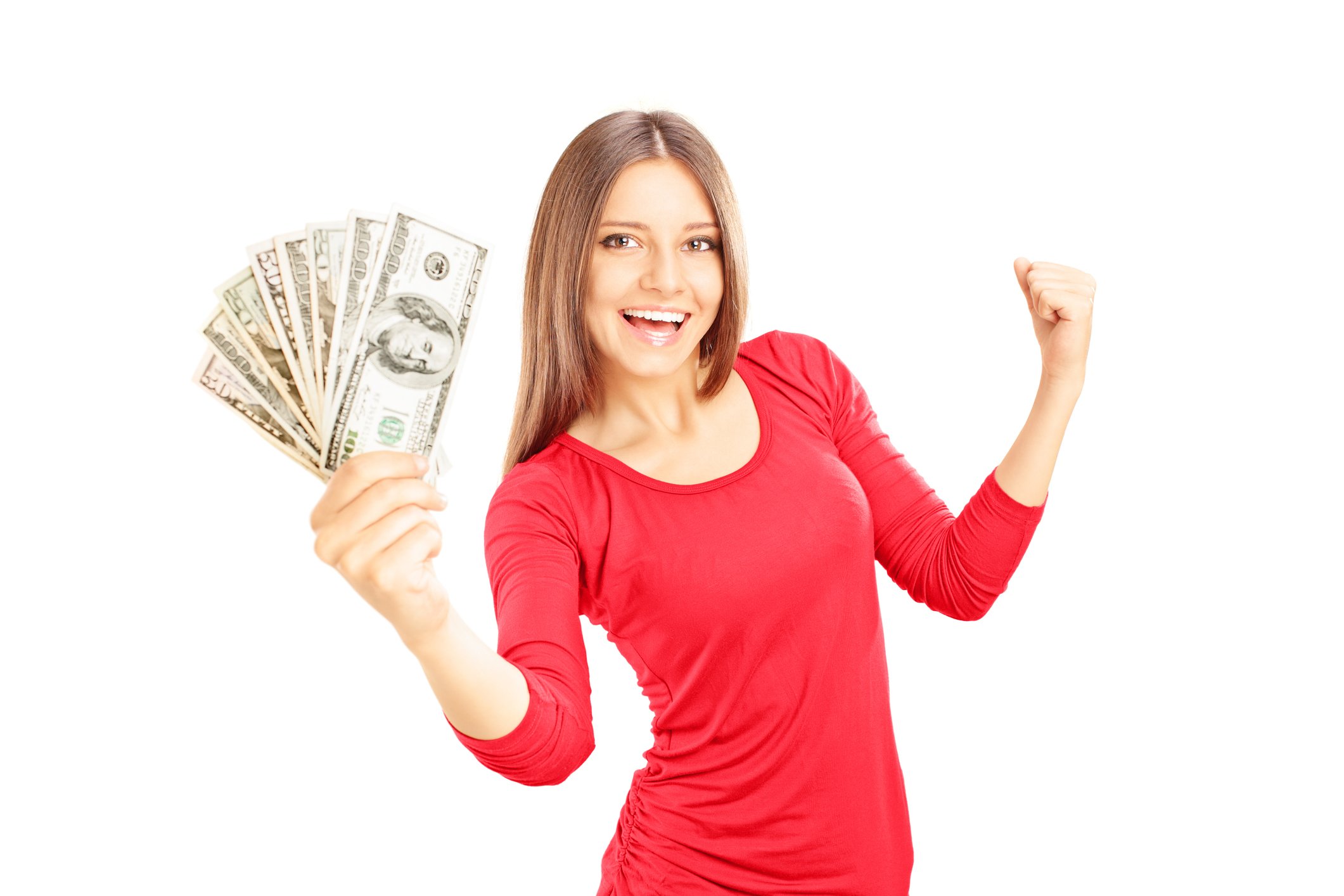 A woman happily holds $100 U.S. banknotes.
