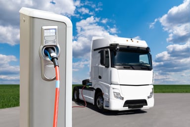 Electric vehicles charging station with a truck.