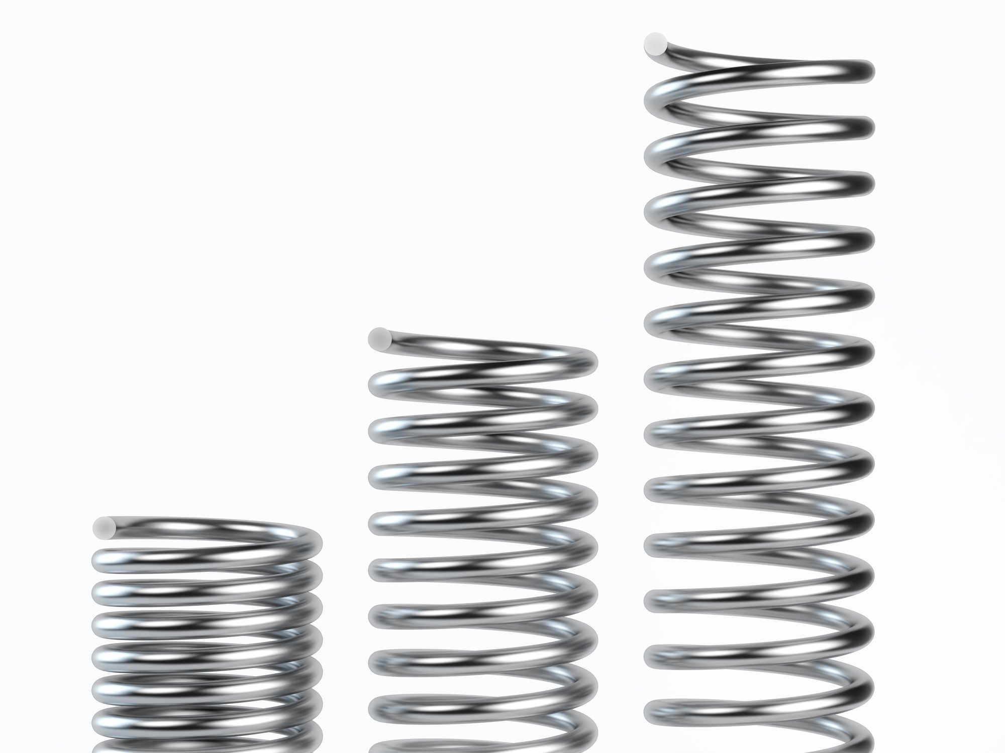 A coiled spring, a partially coiled spring, and an uncoiled spring. 