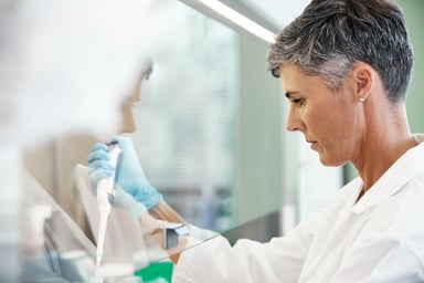 scientist-working-under-fume-hood