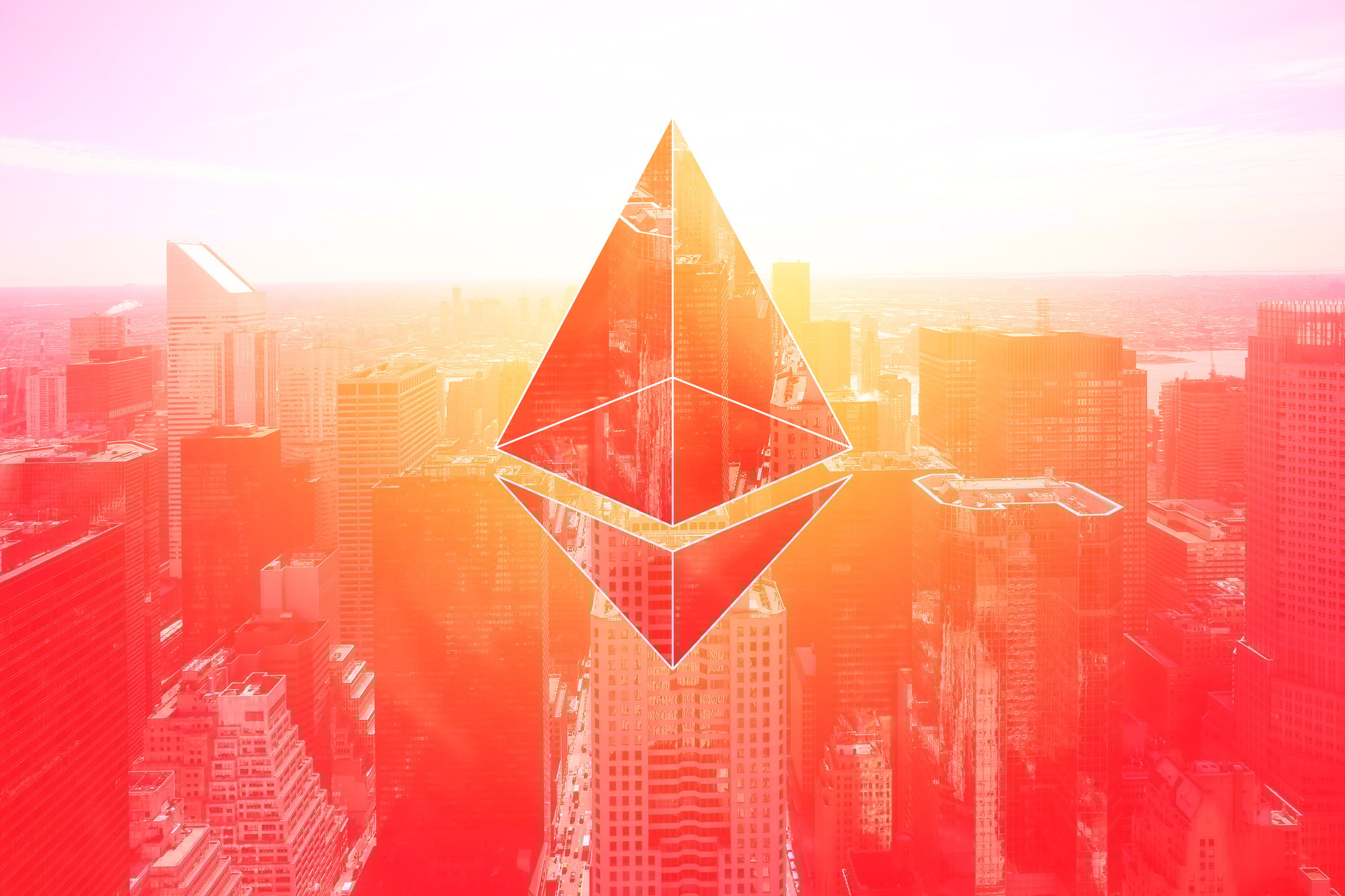 Ethereum logo superimposed over a city skyline.