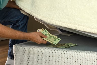 GettyImages-money under mattress