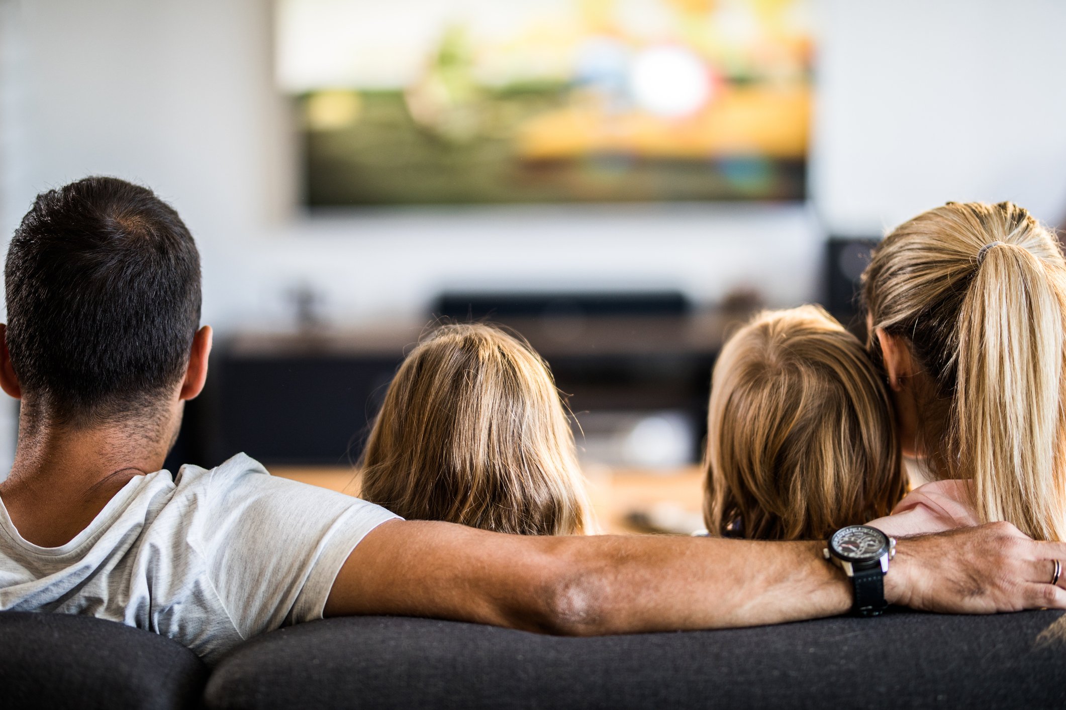 A family watching television.