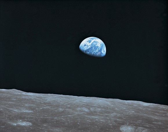 Earth as a blue marble seen from the moon.