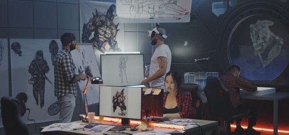 People working together in a video-game design lab.