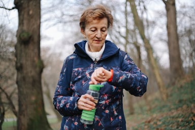 Hiker checking their smartwatch