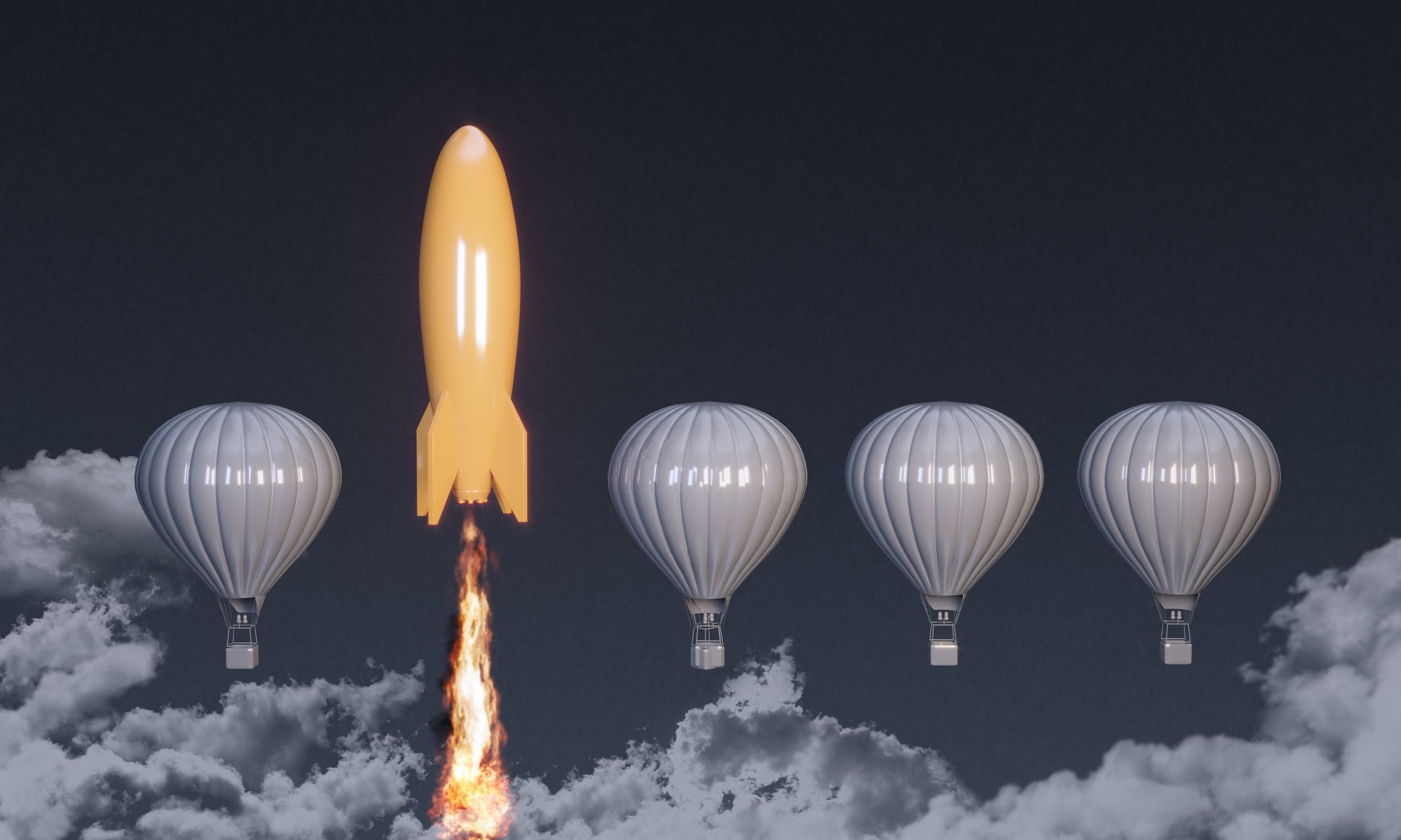 A yellow rocket ship shooting past gray colored hot air balloons. 