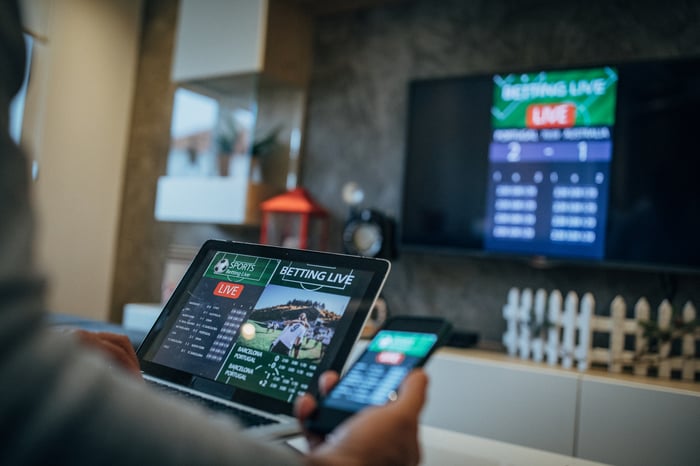 Sports betting on a computer at home. 