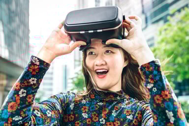 surprised person outside virtual reality headset