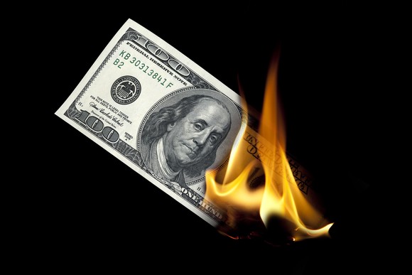 A hundred-dollar bill on fire. 