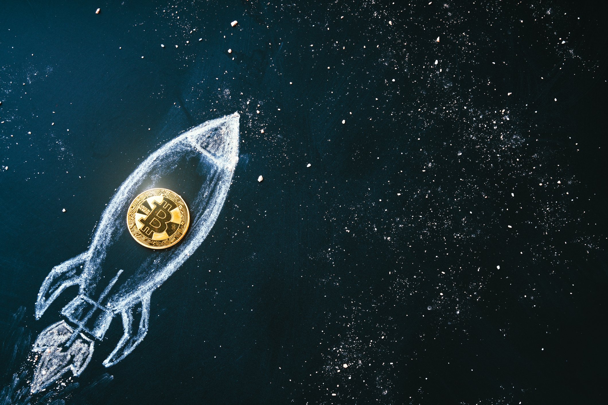 Bitcoin-themed rocket flying through space.