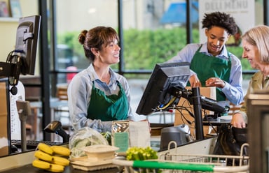People interacting at the supermarket.