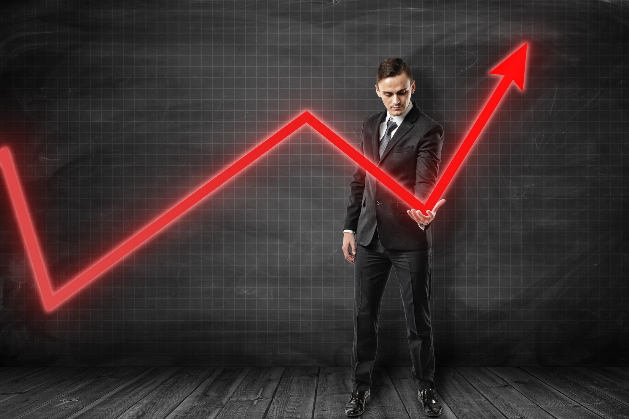 Person touching an arrow just before a rally.