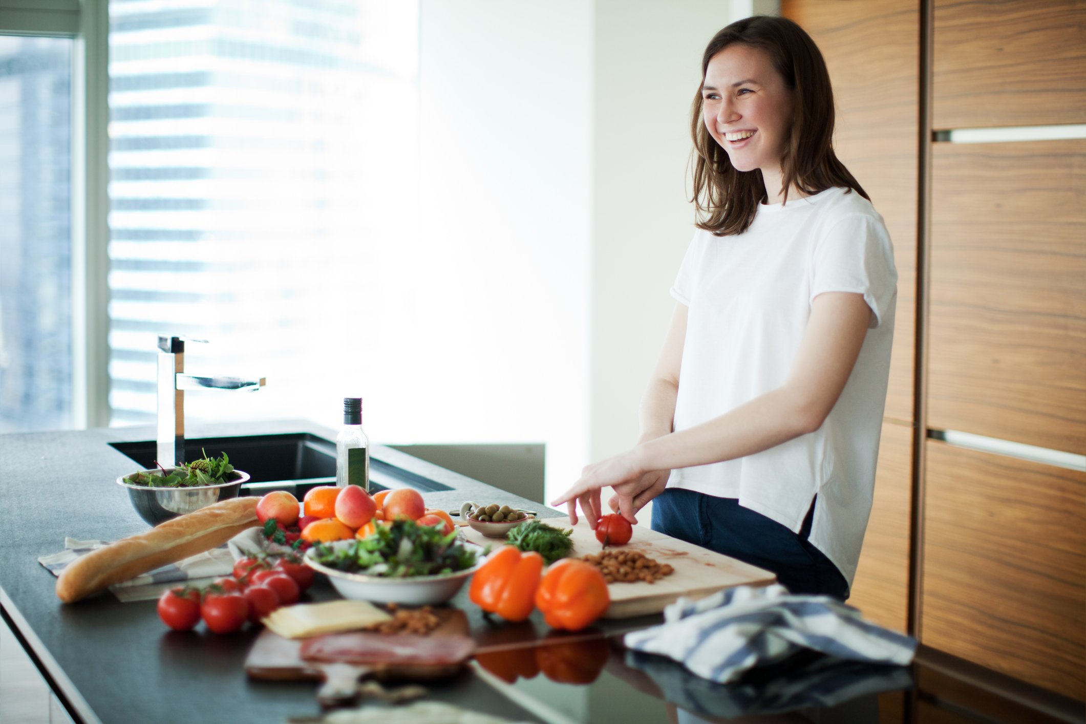 Person preparing food on the counter.